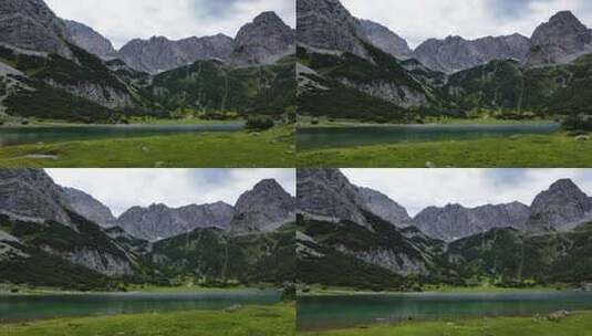Seebensee湖奥地利阿尔卑斯山草水空中山峰高清在线视频素材下载