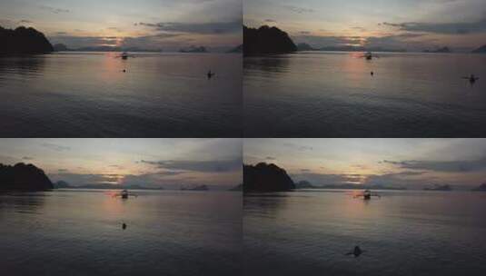 日落与停泊在菲律宾巴拉望埃尔尼多的船只高清在线视频素材下载