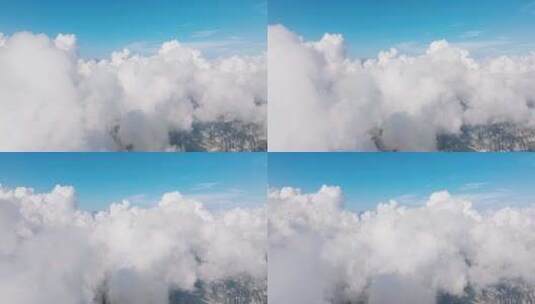 晴天云中穿梭飞行高清在线视频素材下载