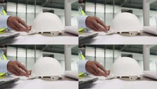 建筑师戴上安全帽高清在线视频素材下载