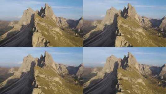 空中吊杆拍摄揭示了意大利白云石塞塞达山的岩石山脊线高清在线视频素材下载