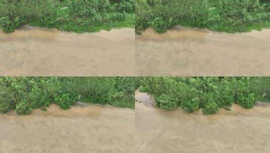 暴雨过后的乡村河流浑浊河水黄色水流航拍河高清在线视频素材下载