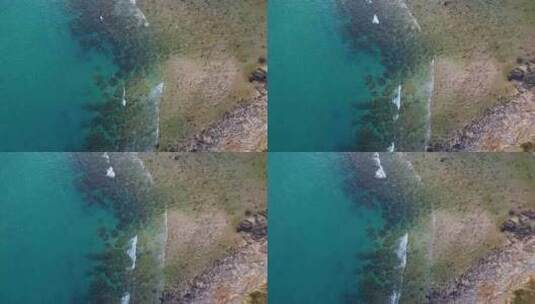 航拍海南三亚西岛海洋文化旅游区海浪礁石高清在线视频素材下载