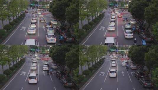 路口缓慢行驶的车流高清在线视频素材下载