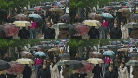 撑伞的人在雨中行走高清在线视频素材下载