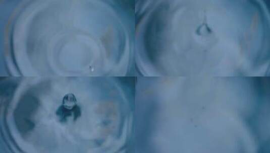 水滴滴落的微距镜头高清在线视频素材下载