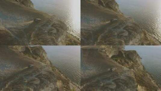 海边悬崖上行驶的汽车高清在线视频素材下载