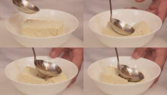 汤勺碾碎豆腐高清在线视频素材下载