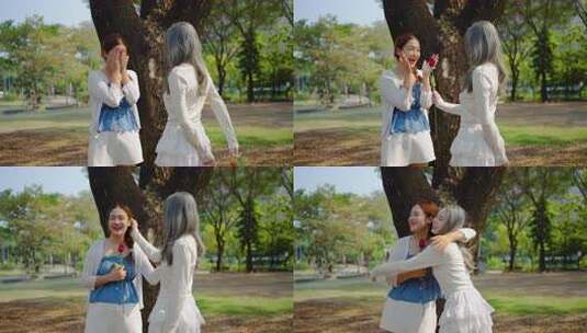 两位年轻的亚洲恋人用玫瑰带来由衷的惊喜。高清在线视频素材下载