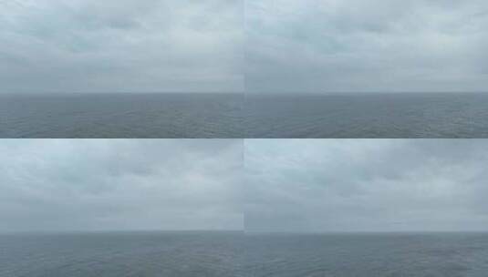 阴天大海航拍海面飞行海平面飞越大海下雨天高清在线视频素材下载