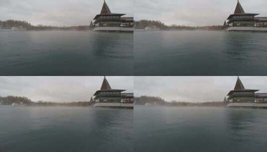 蒸汽和雨水上升的热湖高清在线视频素材下载