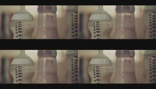 装满牛奶的奶瓶高清在线视频素材下载