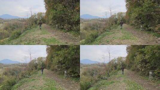 在大自然中行走的年轻人高清在线视频素材下载