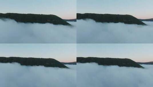 覆盖山谷的低空云层航拍高清在线视频素材下载
