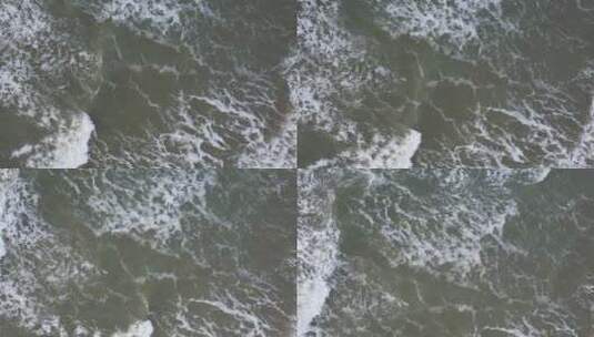 航拍飞越威海靖水湾波涛汹涌的海面高清在线视频素材下载