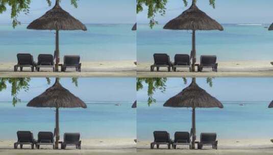 热带海滩上的空木椅高清在线视频素材下载