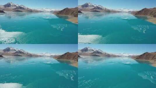 冬季羊湖浮冰雪山高清在线视频素材下载