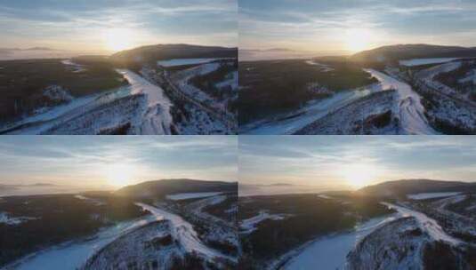 航拍冬季雪原河湾暮色高清在线视频素材下载