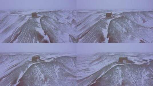下雪天航拍山区峡谷边烽火台高清在线视频素材下载