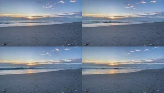 傍晚海浪冲刷贝壳沙滩孤独人影高清在线视频素材下载