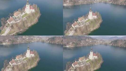 斯洛文尼亚布莱德湖中间有一座小教堂的岛屿鸟瞰图高清在线视频素材下载
