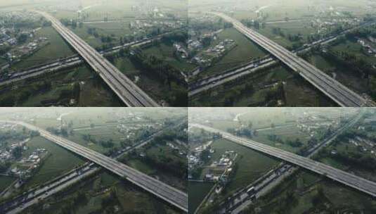 4K航拍在农村穿行而过的城市高速路高清在线视频素材下载
