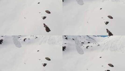 航拍旅行者攀登雪山高清在线视频素材下载