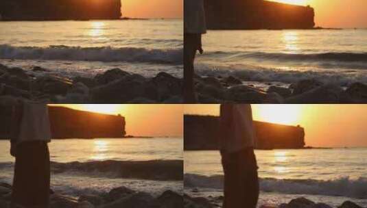 山东烟台夕阳落日下，大海边的女孩背影高清在线视频素材下载