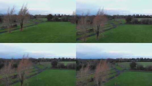 空中——飞过公园上空的草地。都柏林市区，爱尔兰，欧洲。高清在线视频素材下载