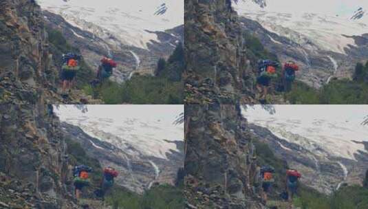 攀登川西加拉本森雪山的登山者徒步行进高清在线视频素材下载