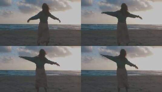 4K-海边沙滩上享受海风的女孩背影高清在线视频素材下载