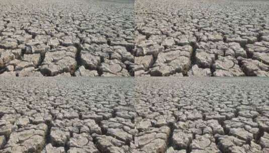 干旱土壤和干旱干涸的土地龟裂干旱土壤高清在线视频素材下载