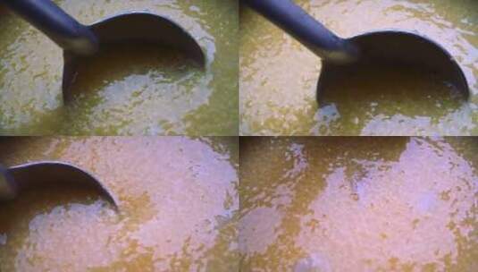 熬煮小米粥高速摄像高清在线视频素材下载