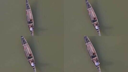 在伊查马蒂河上钓鱼的传统木船线上孤独渔夫的俯视图高清在线视频素材下载