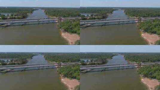 德克萨斯州休斯顿圣哈辛托河大桥上行驶的汽车天线高清在线视频素材下载