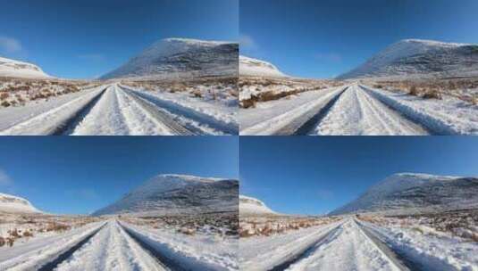 开车穿过雪山雪地高清在线视频素材下载