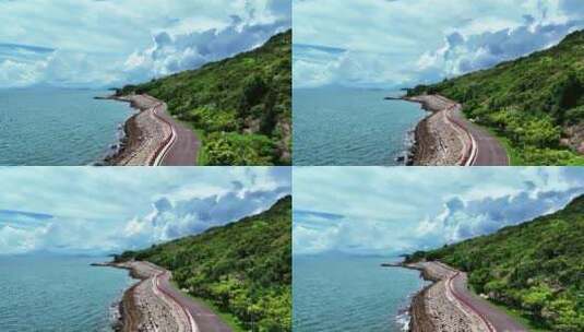 航拍蓝色海洋海岸线绿道旅游公路自然海景高清在线视频素材下载