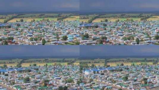 航拍新疆夏塔乡的彩色房屋高清在线视频素材下载