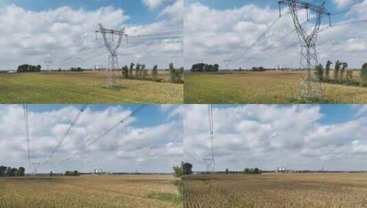 农田里的高压电线电力塔高清在线视频素材下载