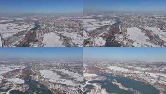 冬天冰天雪地下的县城航拍高清在线视频素材下载