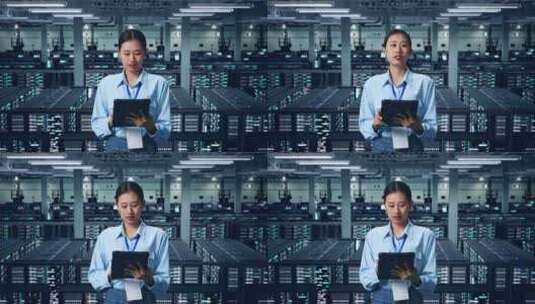一位使用平板电脑的亚洲女商人在数据中心环高清在线视频素材下载