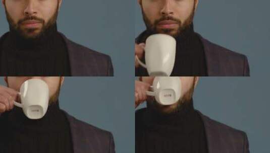男人用杯子喝水高清在线视频素材下载
