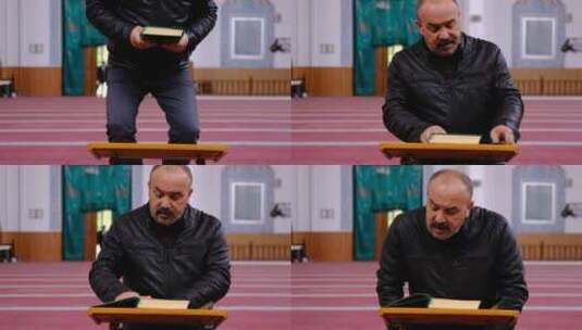 一个男人在清真寺读古兰经高清在线视频素材下载