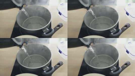 厨师将开水倒入锅中高清在线视频素材下载