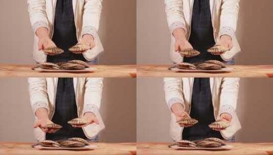 扇贝壳带壳扇贝挑选肉多扇贝的方法高清在线视频素材下载