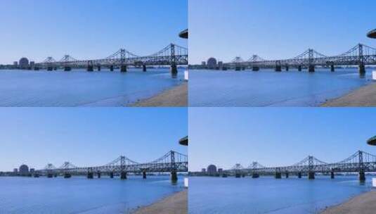 鸭绿江铁路桥晴朗蓝天下的唯美自然风景高清在线视频素材下载