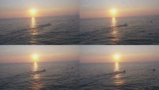 广西涠洲岛日落时分摩托艇运动高清在线视频素材下载
