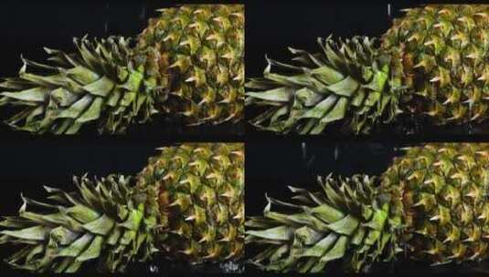 新鲜菠萝配绿色水滴。高清在线视频素材下载