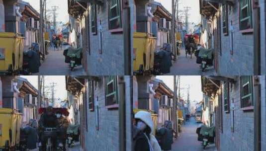 老北京胡同冬天游客坐黄包车高清在线视频素材下载