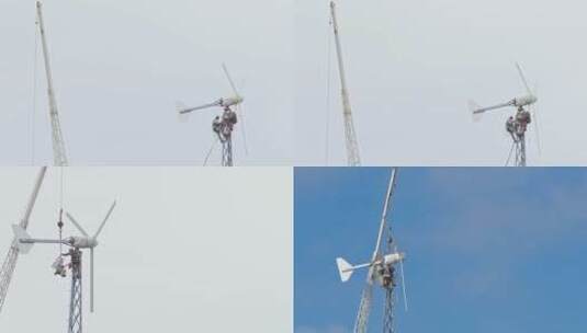 风车检修工人在风车上工作高清在线视频素材下载